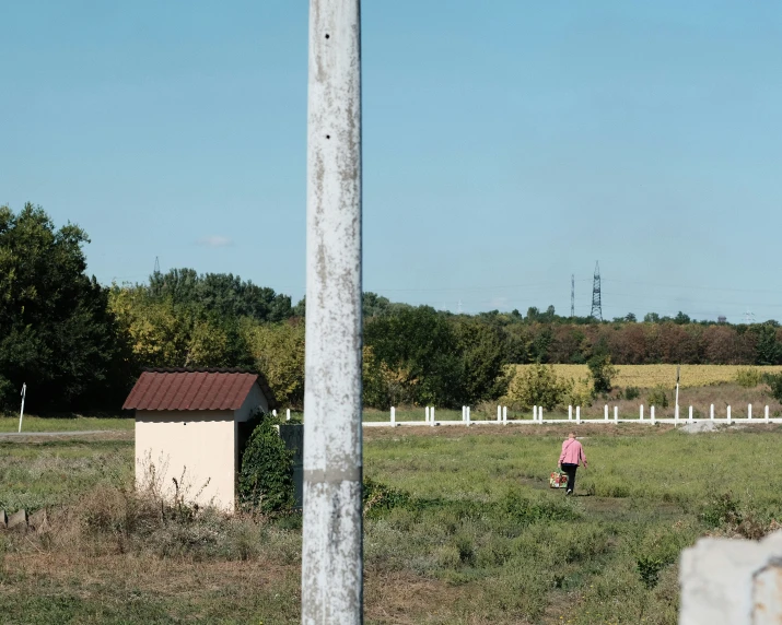 an abandoned building sitting next to a road