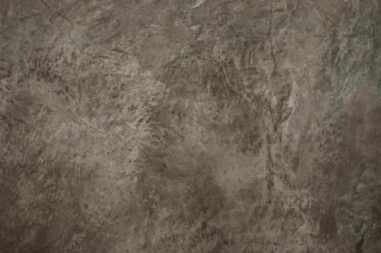 a close - up image of a gray painted concrete background