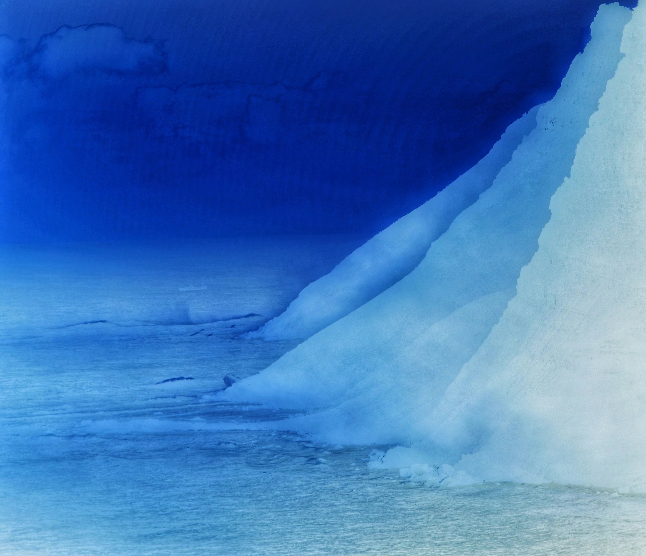 a snowy mountain is seen with ice on it