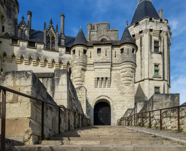 the castle with the stairs going up to it