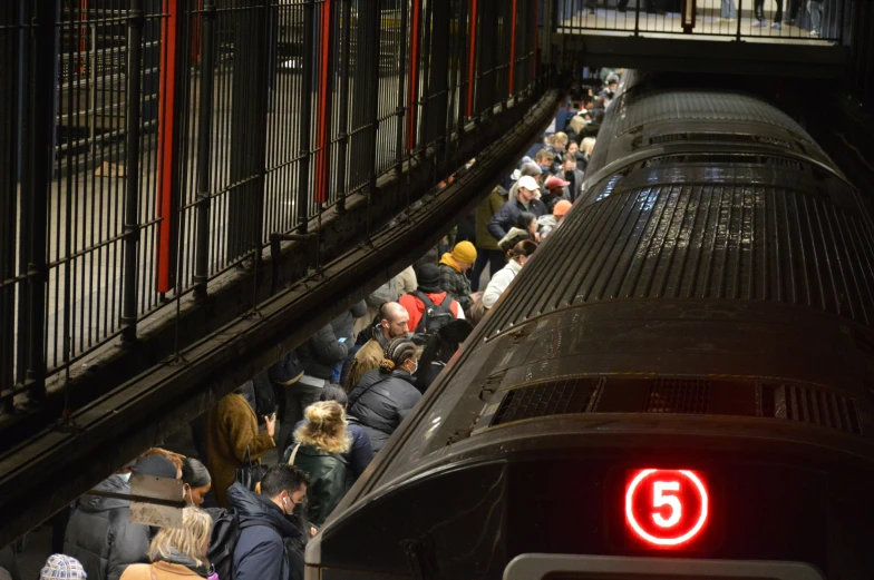 a train is full with people inside of it