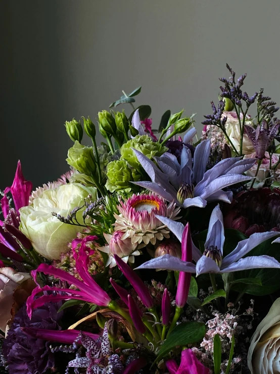 a bunch of flowers that are on a table