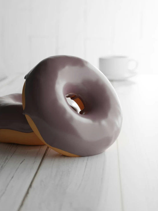 two glazed donuts stacked on top of each other