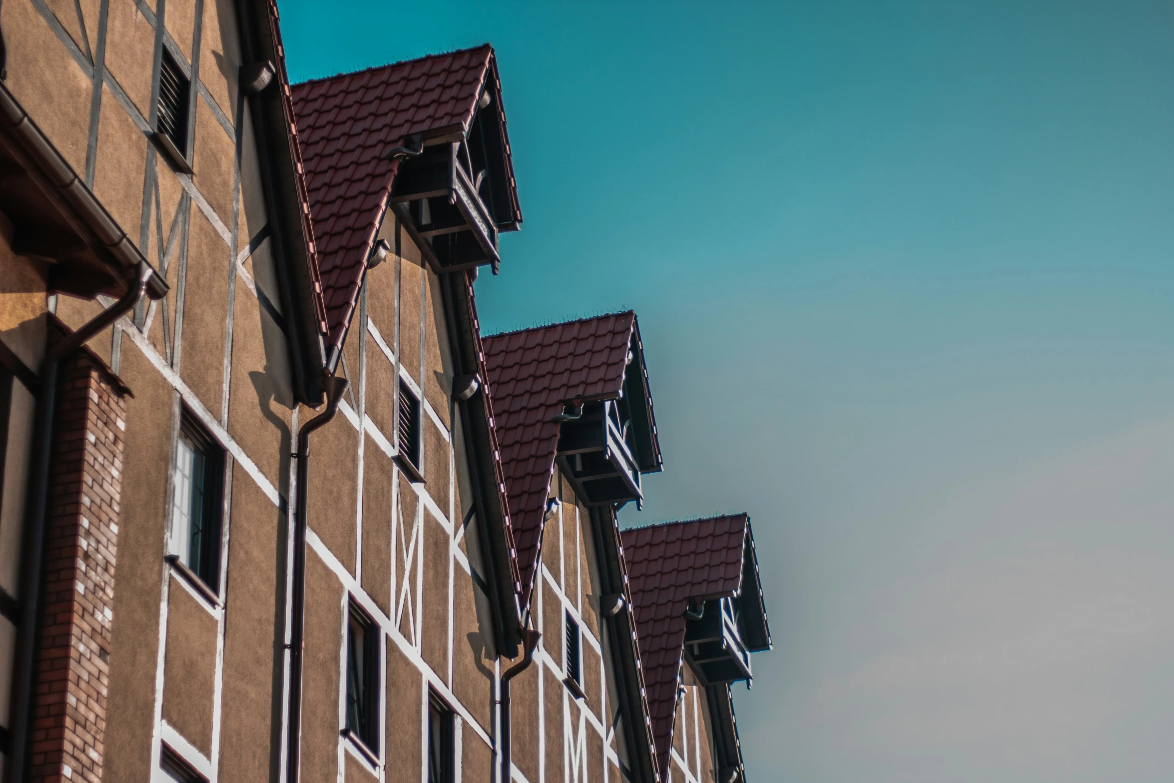 a brick building with many windows on both sides