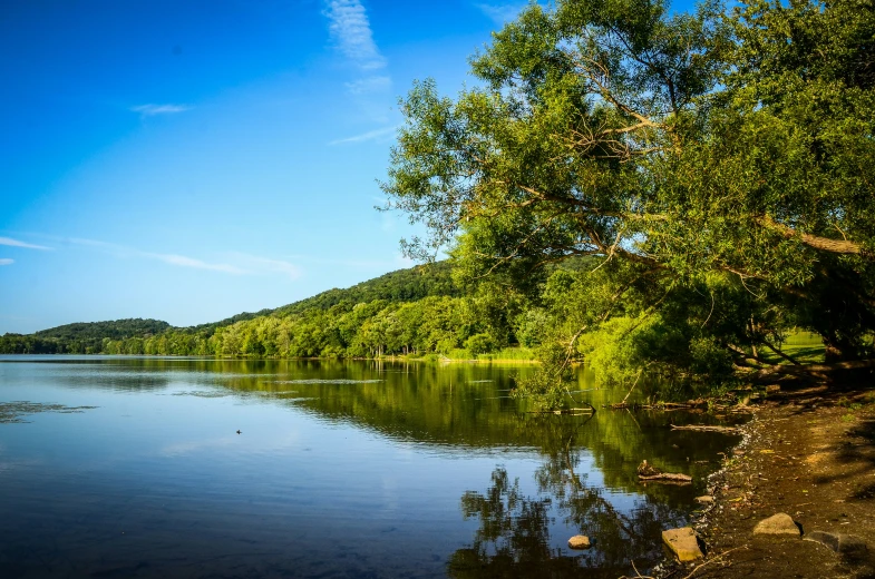 a beautiful lake is in the middle of a mountain