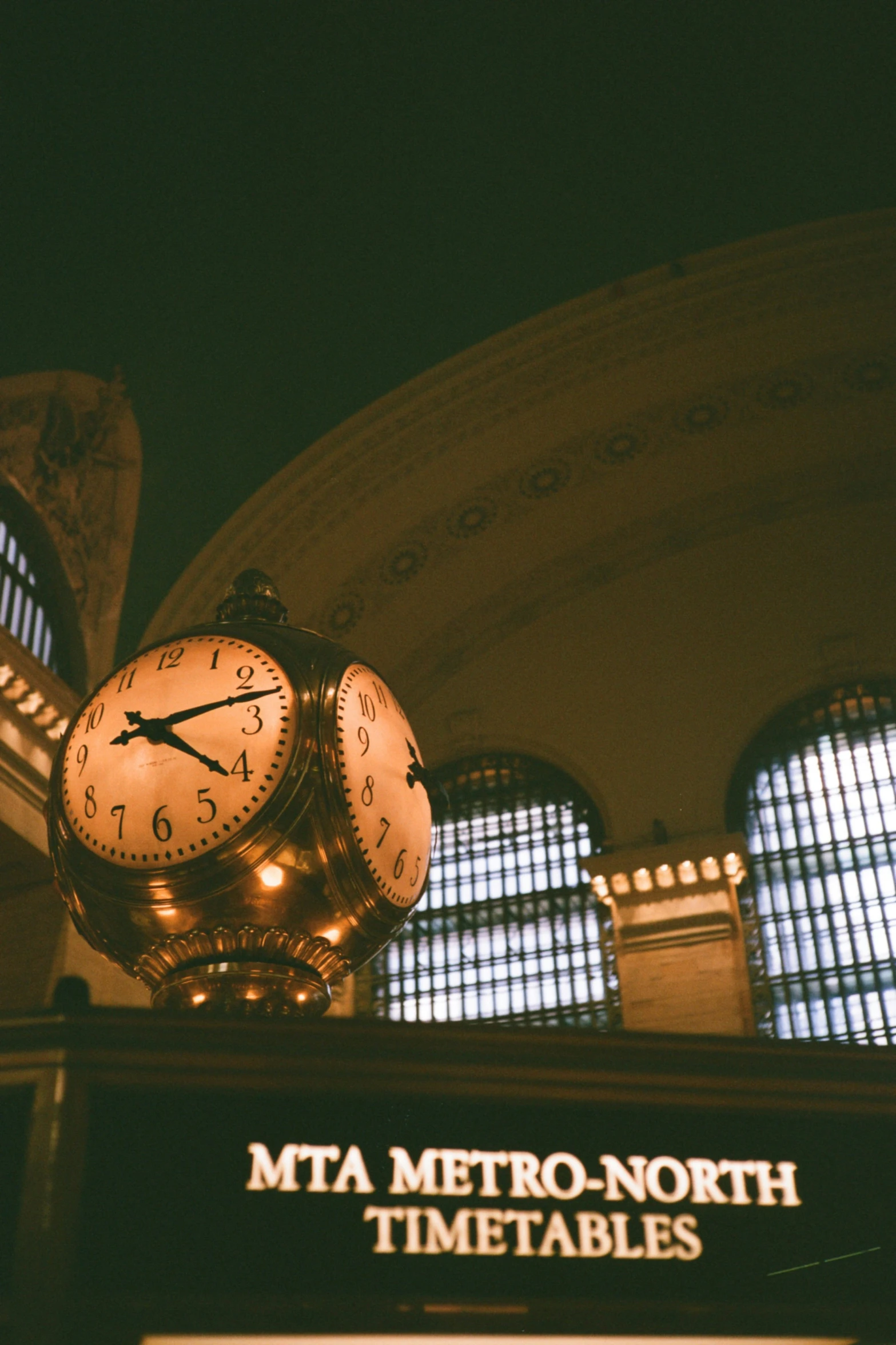 a large ss clock with roman numerals on top