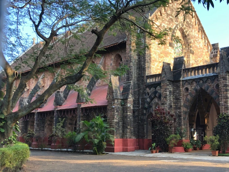 an old church with a clock tower next to it