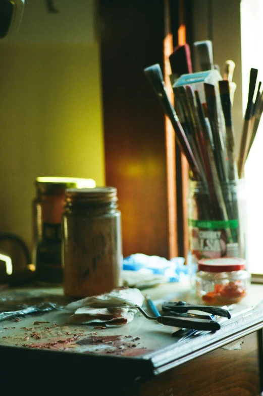 there is an assortment of tools that are sitting on top of the table