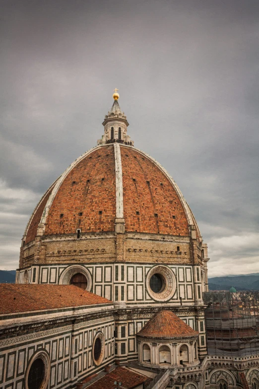 dome on top of a building with orange tiled roof