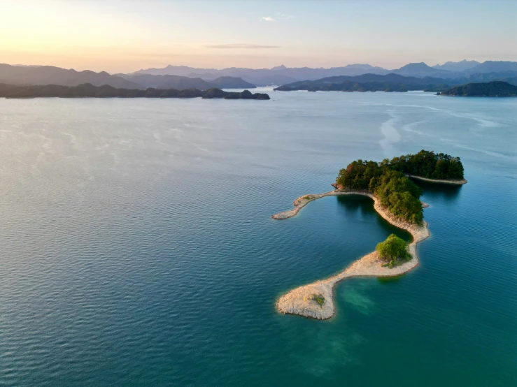 two island in an island surrounded by blue water