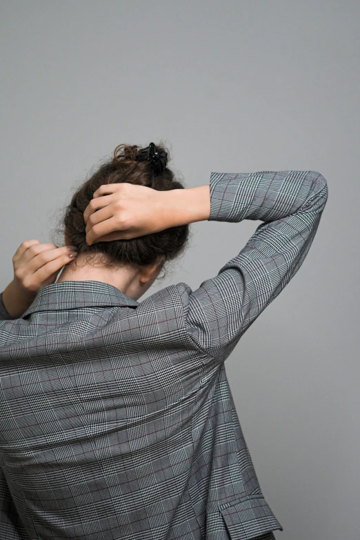 an image of a woman that is covering her ears