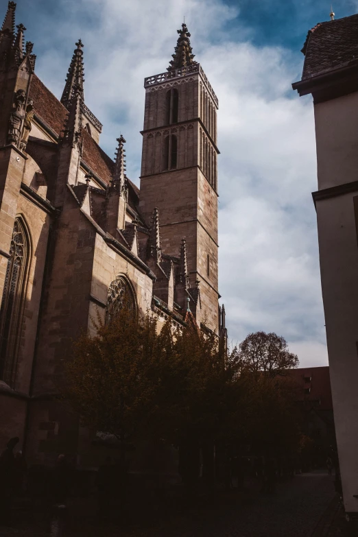 two tall building with several windows and a clock