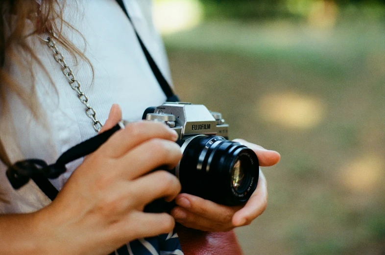 someone holding up their camera and taking a picture