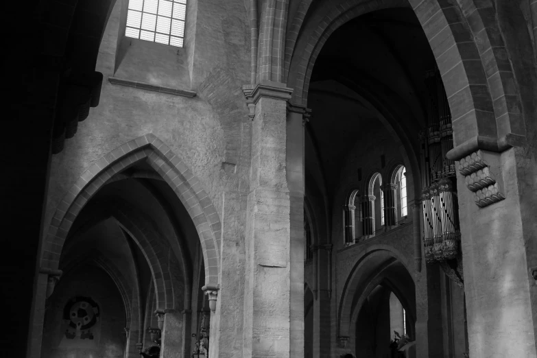 inside of an old church with pews and walls