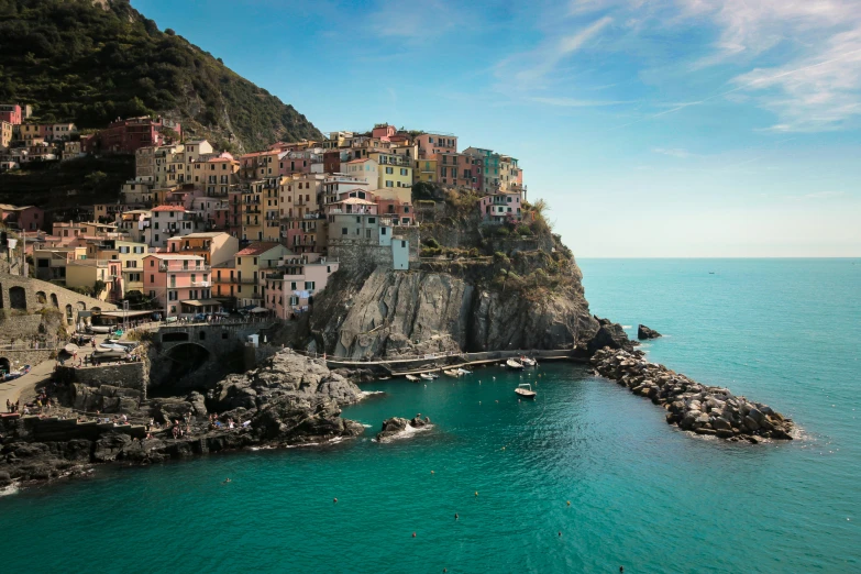 a beautiful island with lots of buildings sitting on top of it