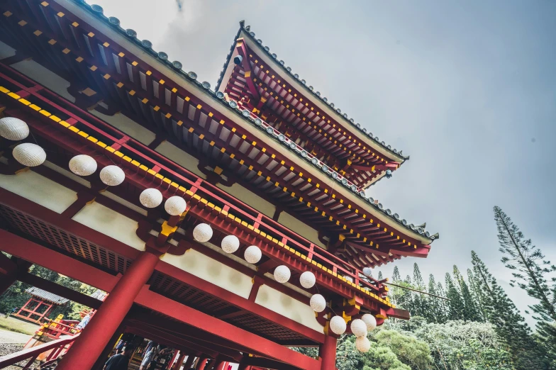 a tall red building with two tall towers