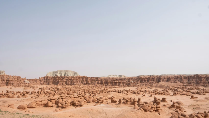 view of dry land area near an arid mountain side