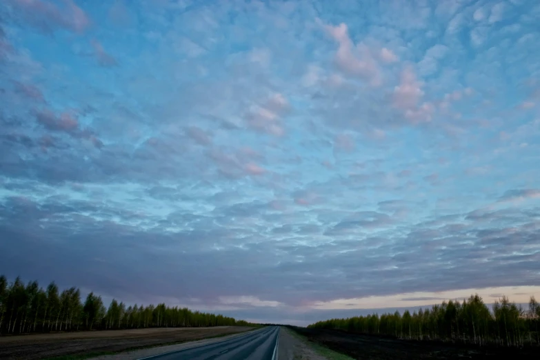 a truck is going on a rural road