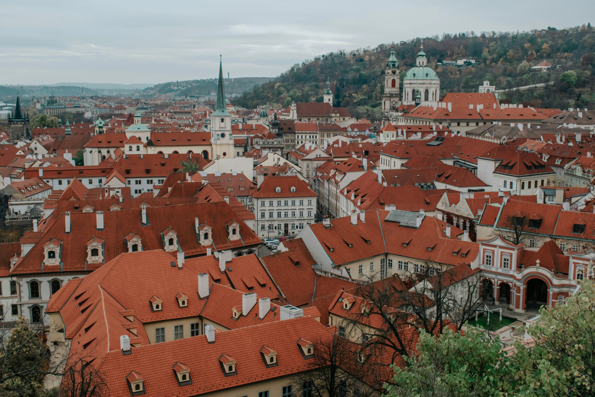 a large city has many buildings on the hillside