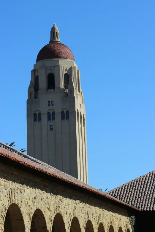 a view of a building with a clock tower on top