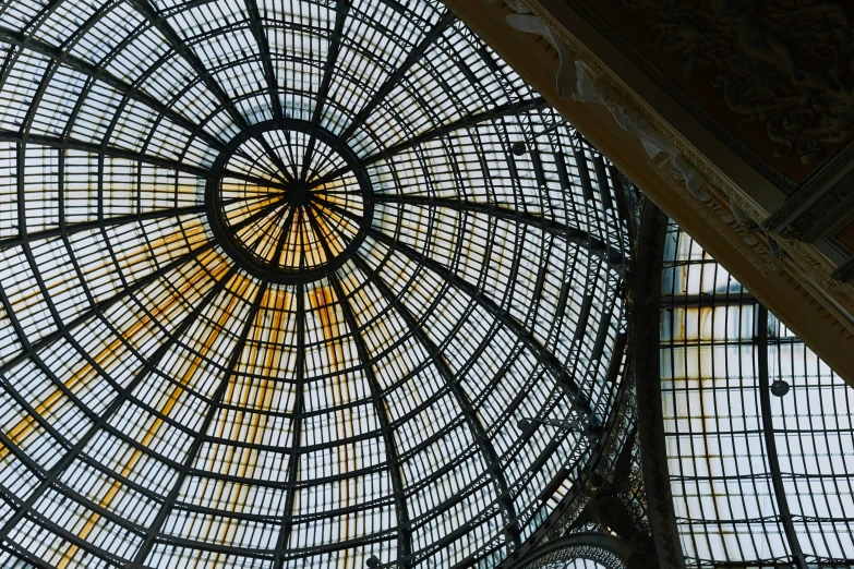 a glass roof in a building that is open