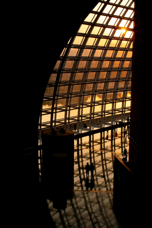 the inside of a building with large glass walls