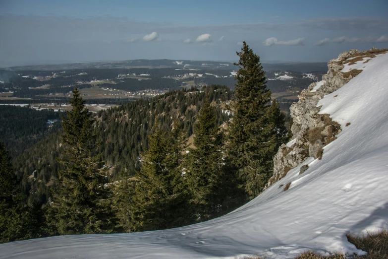 there is a snow boarder riding down a hill