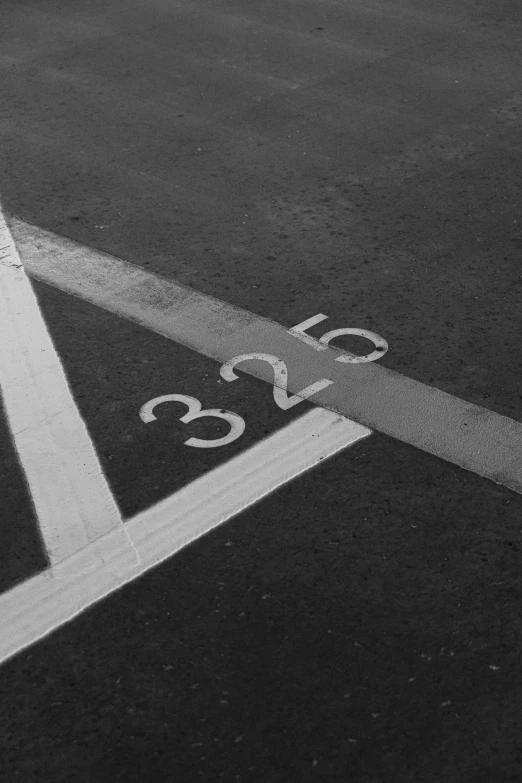 an overhead view of two parking meters on a street