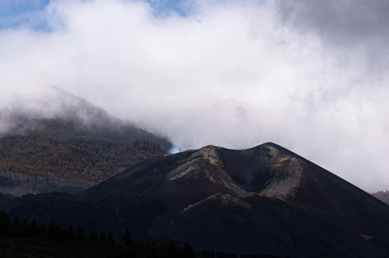 a beautiful view of a mountain, from below