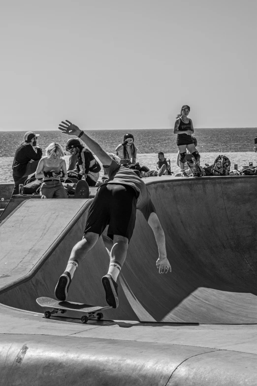 the skateboarder is attempting to do a trick on a ramp