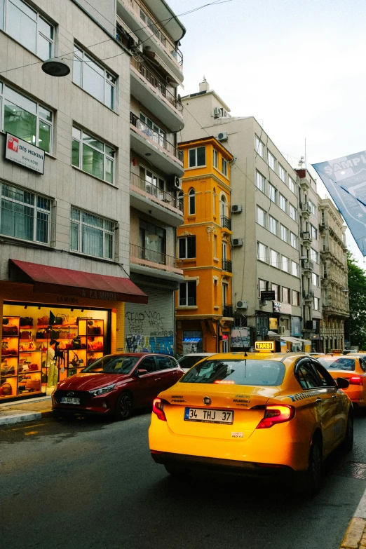 many cars drive through a city intersection