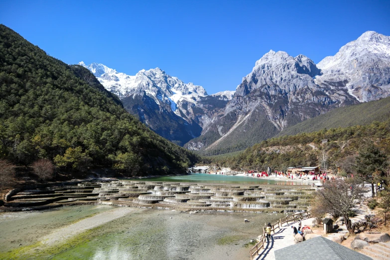 a landscape s of a mountain valley with small village and buildings