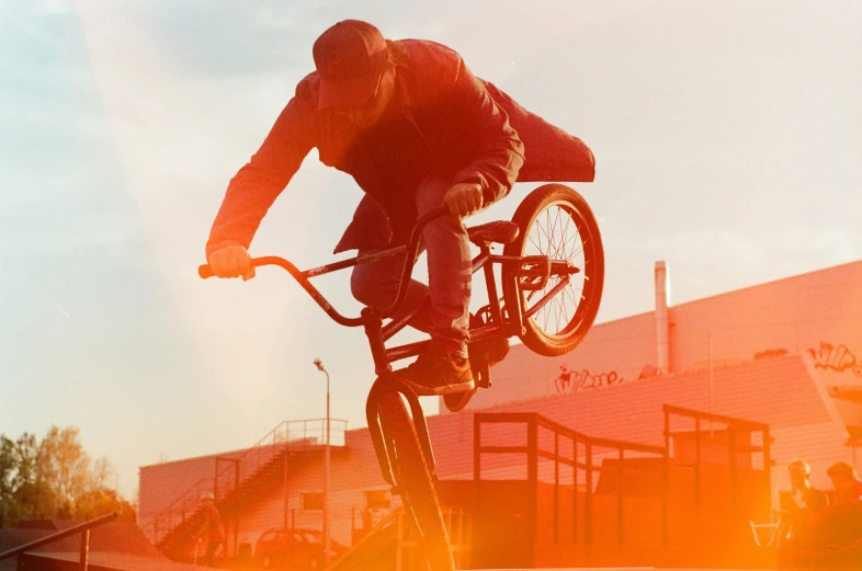 a man is doing a trick on his bicycle