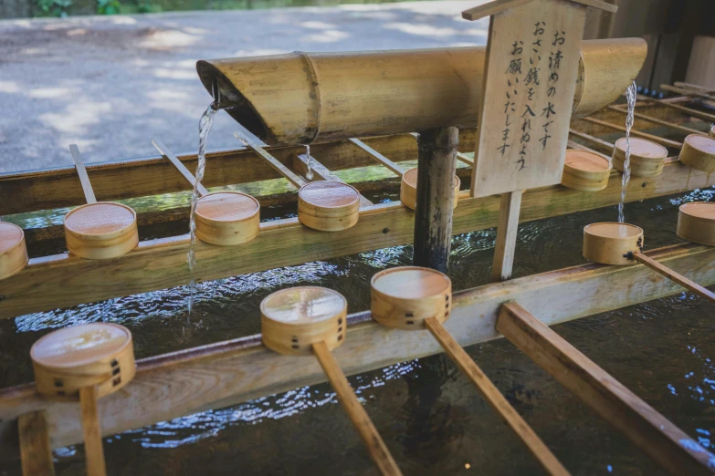 several wooden containers and some water in a body of water