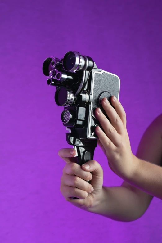 a person taking pictures with their video camera