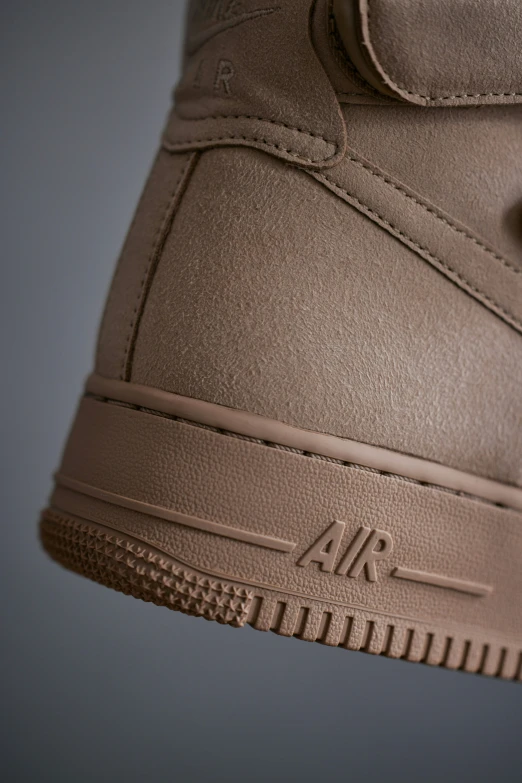 the air force 1 sneaker has brown leather