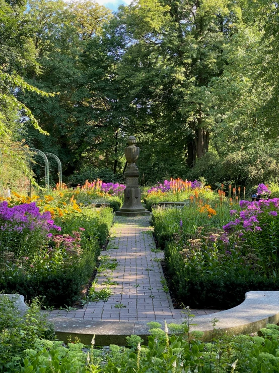 an open air garden with many colorful flowers