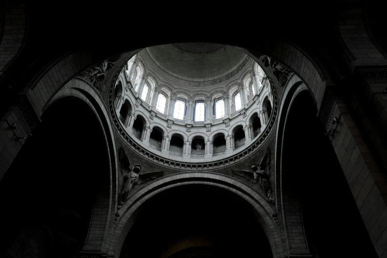 a room filled with lots of tall arches