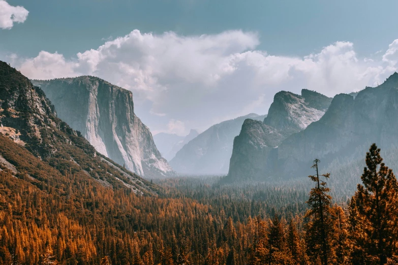 a very large rock in the middle of a mountain