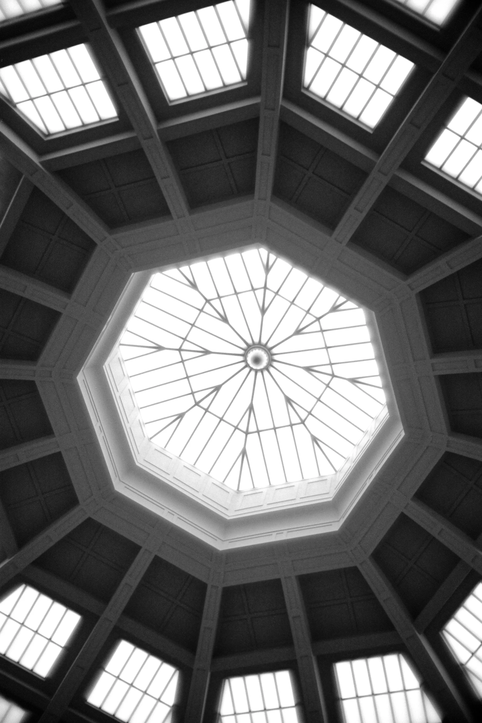 the view looking up at an overhead roof made of glass