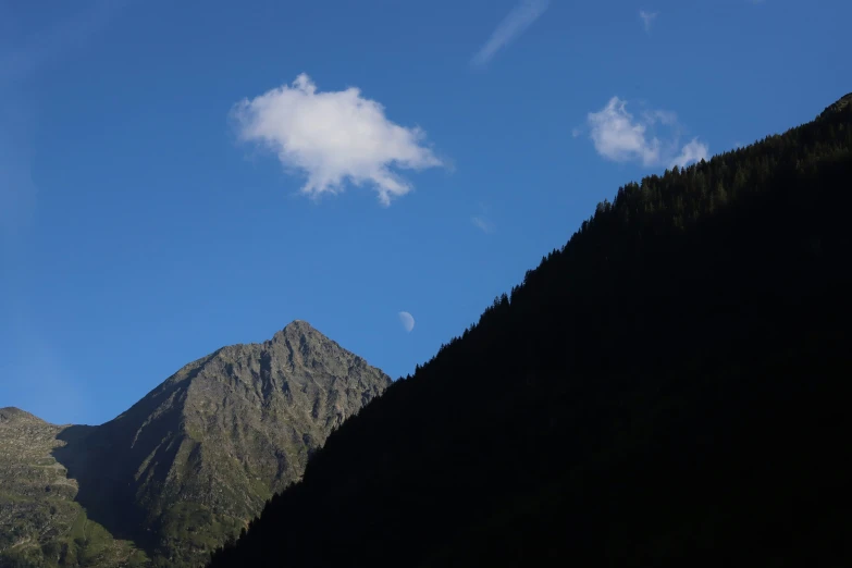 a beautiful view of the mountains with clouds