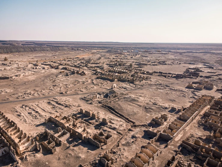 an aerial view shows a desert landscape with no people