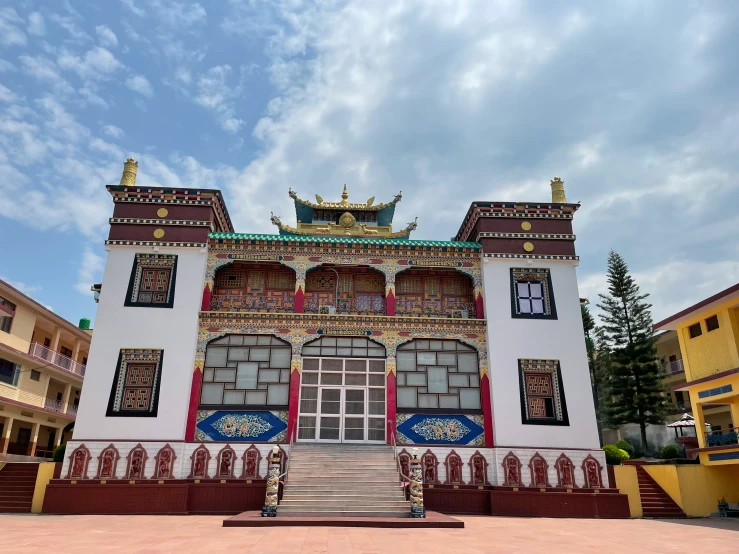 a very elaborate building that is outside in a square