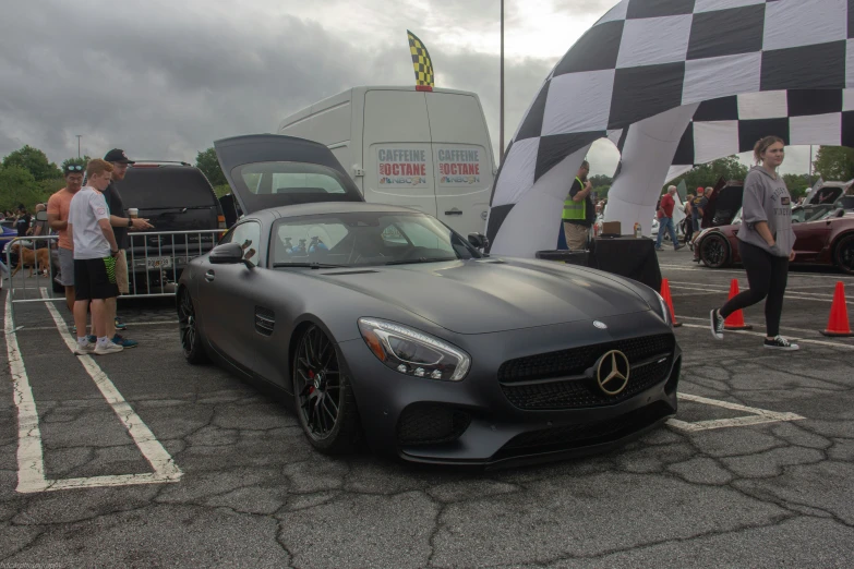 a mercedes sports car parked in the lot