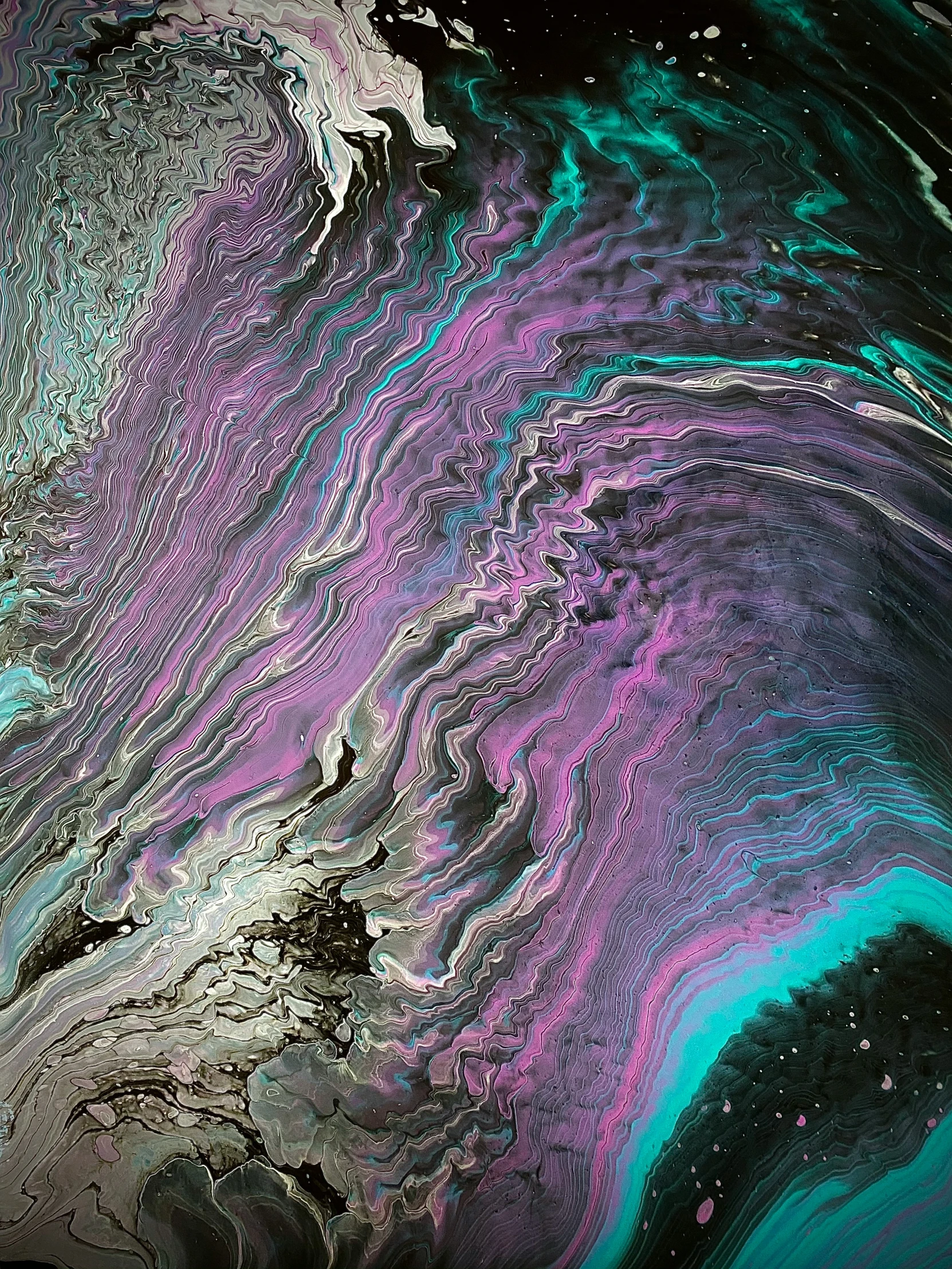 an artistic background with purple and blue fluid paint