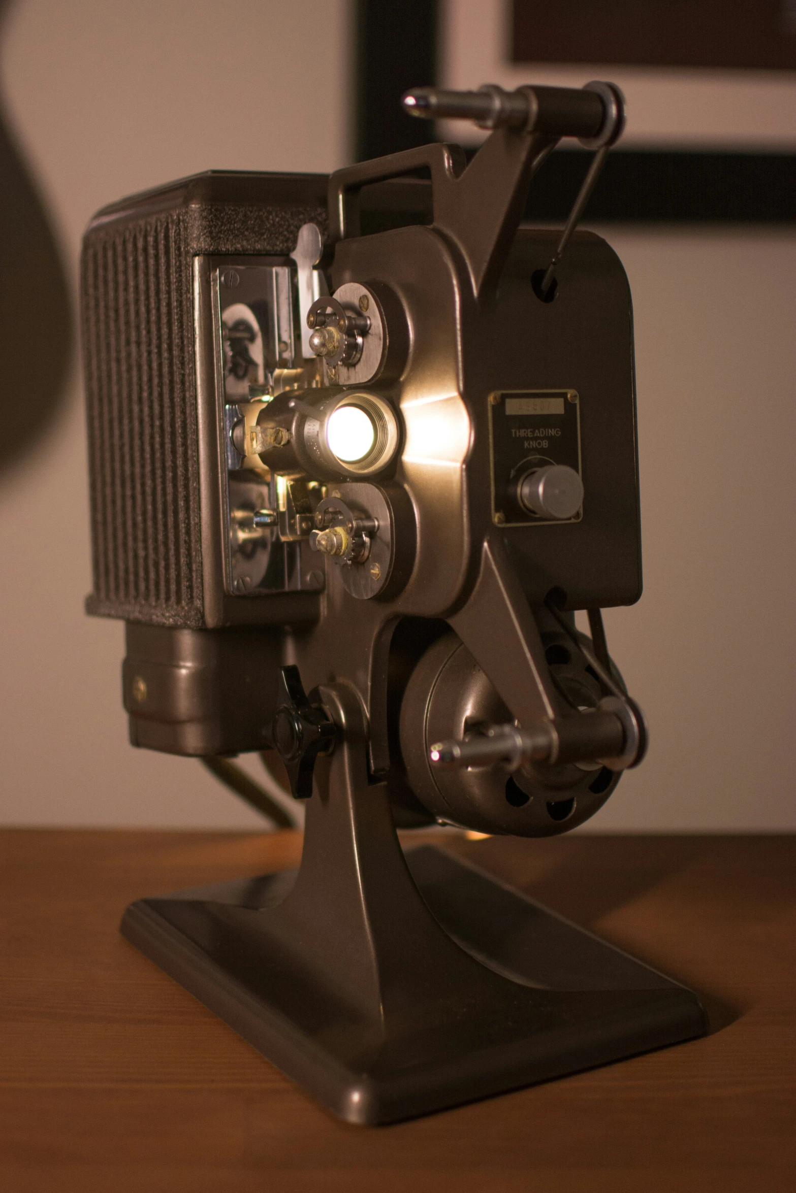 an old camera is on top of a table