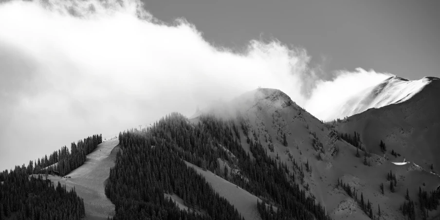 black and white po of snow covered mountains