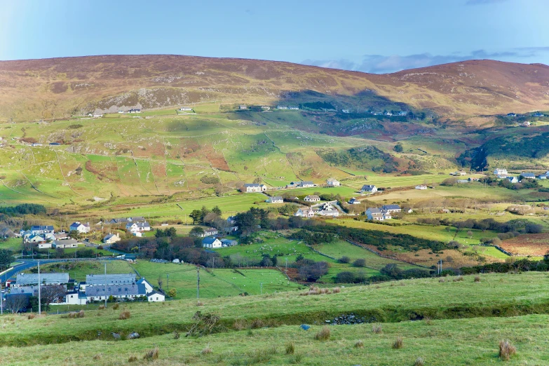 there is a small village nestled between some mountains