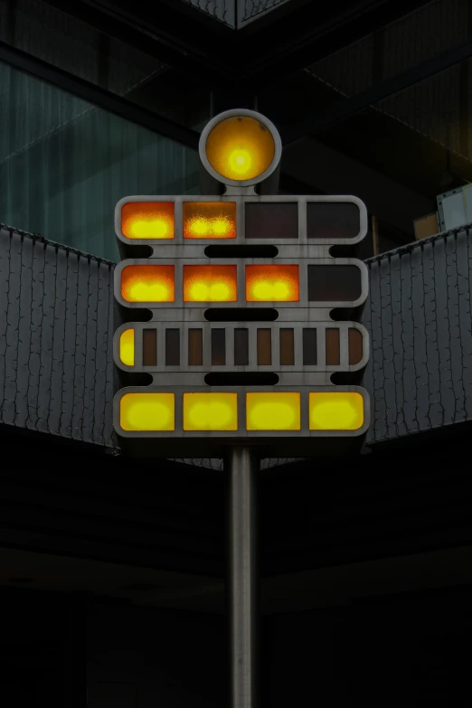 a road sign displays the number and colors of orange