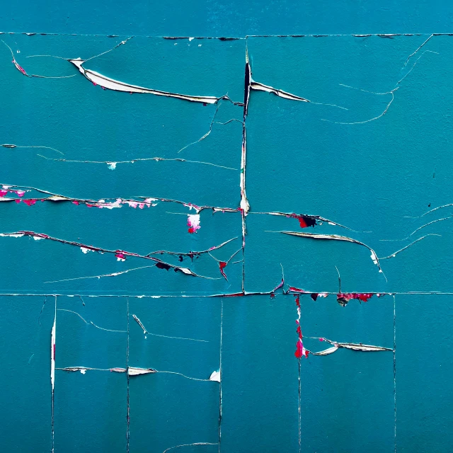 an upside down picture of three boats in a blue water